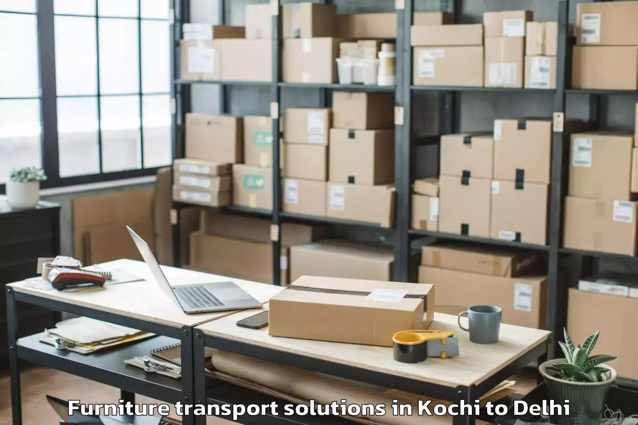 Book Kochi to Omaxe Connaught Place Furniture Transport Solutions Online